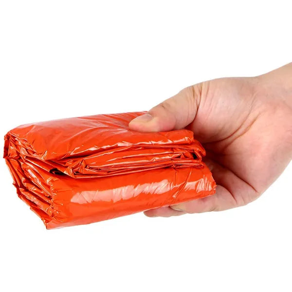 Termo vészhálózsák mentősíppal felszerelt tároló táskával, hőtartó, vízálló és szélálló, 200x90 cm, narancssárga